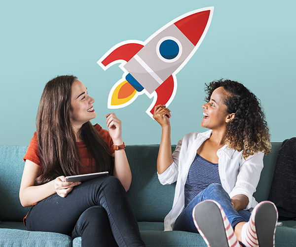 cheerful-women-holding-rocket-icon